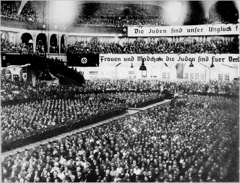 Anti - Jewish slogans on banners displayed at a Nazi party rally in Berlin.